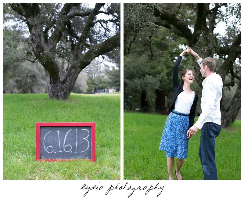Chalkboard sign and bride and groom dancing engagement portraits at Ragle Ranch Park in Sebastopol, California in Napa Valley