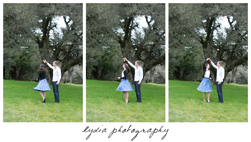 Bride and groom dancing infront of a tree engagement portraits at Ragle Ranch Park in Sebastopol, California in Napa Valley