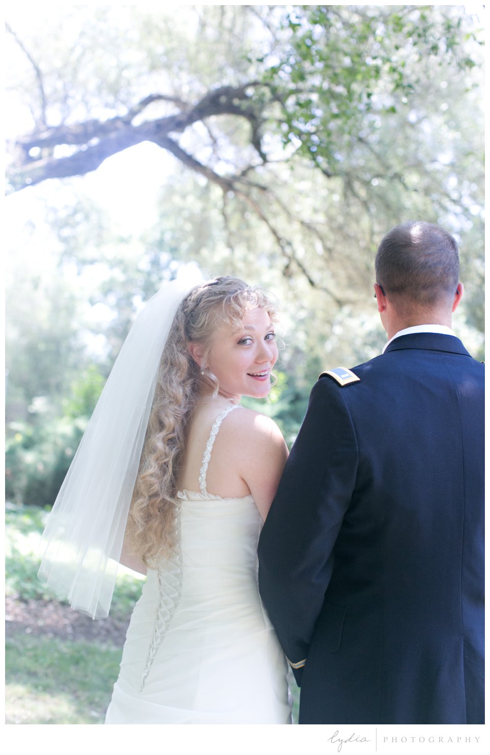 Bride looking back at ethereal wedding in Santa Rosa, California