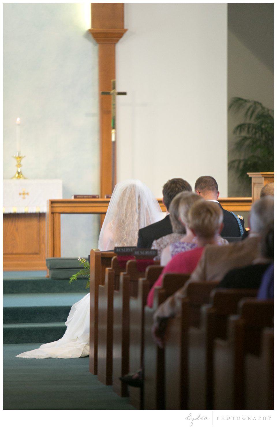 Bride and groom praying at ethereal wedding in Santa Rosa, California