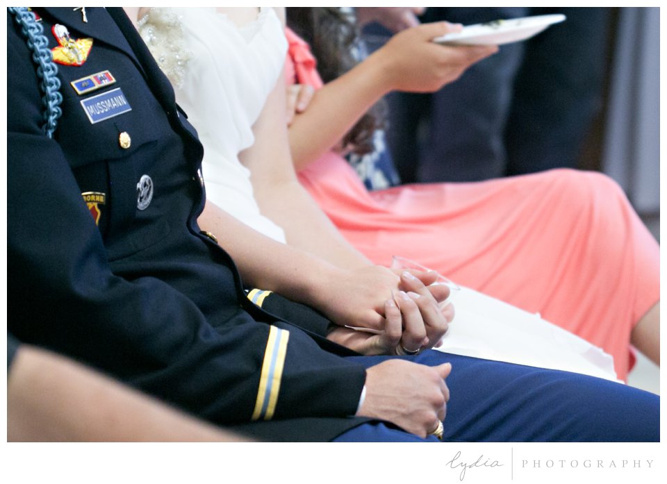 Bride and groom in army dress blues holding hands at ethereal wedding in Santa Rosa, California