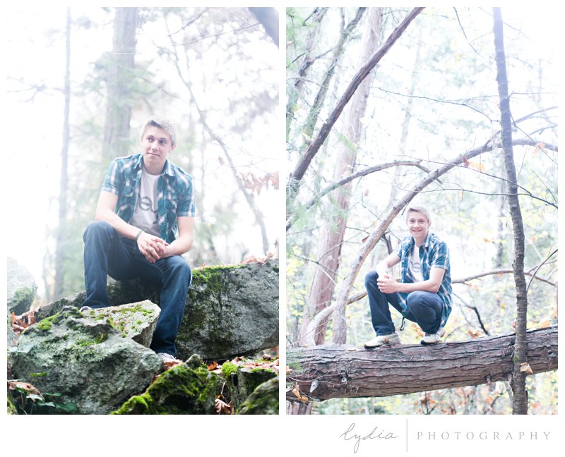 Guy sitting on rocks and a tree for high school Ghidotti senior portraits at Little Deer Creek Trail in Nevada City, California 