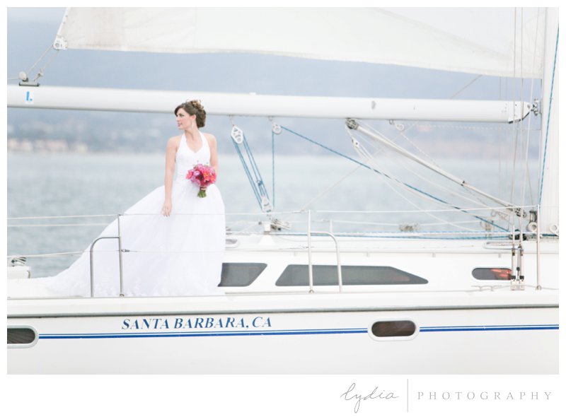 Bride on front of the boat for a nautical wedding styled inspiration portraits in Santa Barbara, California.