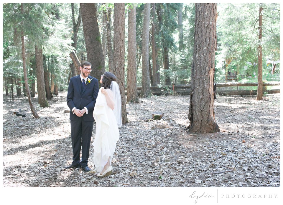 Bride and groom First Look at Harmony Ridge Lodge Jewish wedding in the Tahoe National Forest in California.