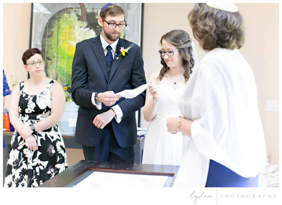 Ketubah agreement at Harmony Ridge Lodge Jewish wedding in the Tahoe National Forest in California.