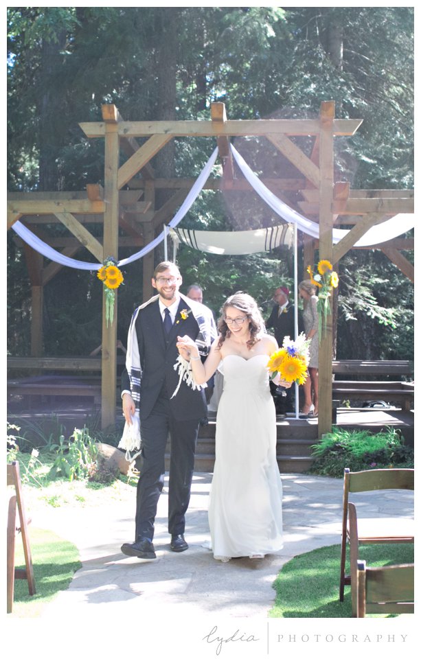 Mr. and Mrs. at Harmony Ridge Lodge Jewish wedding in the Tahoe National Forest in California.