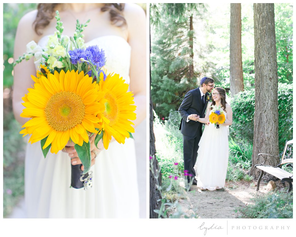 Sunflower bouquet and couple at Harmony Ridge Lodge Jewish wedding in the Tahoe National Forest in California.
