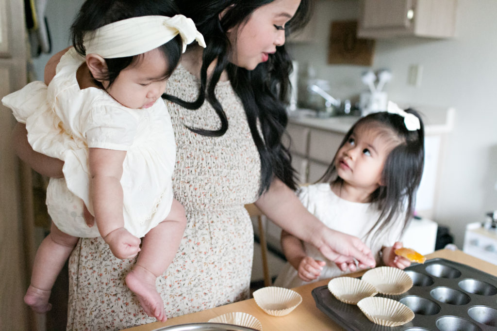 Mom teaching daughter to bake at Sacramento lifestyle family portraits
