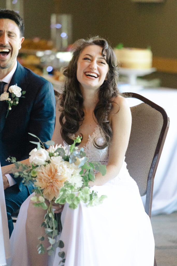 Bride and groom laughing at Lake Wildwood wedding in Penny Valley, California