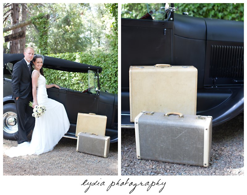 Bride and groom with a T-moblie car and luggage at vintage wedding at the Roth Estate in Nevada City, California