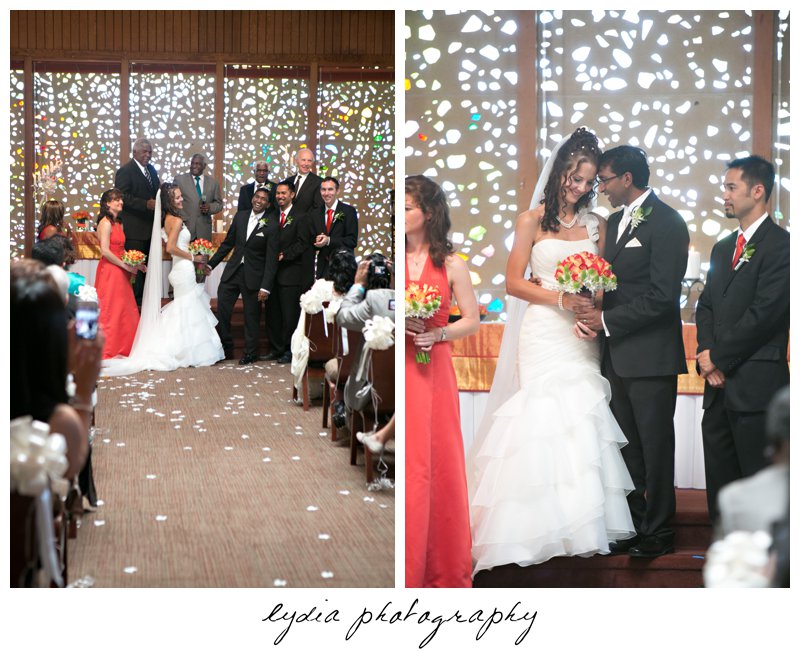 Bride and groom at the aisle at elegant Sausalito, California wedding at The Spinnaker