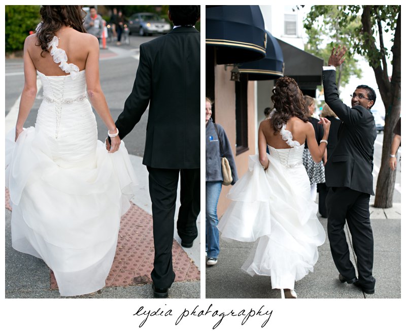 Bride and groom walking at elegant Sausalito, California wedding at The Spinnaker