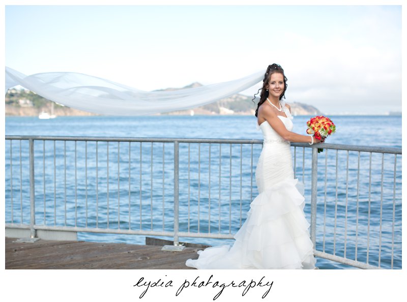 Bride with bouquet at elegant Sausalito, California wedding at The Spinnaker