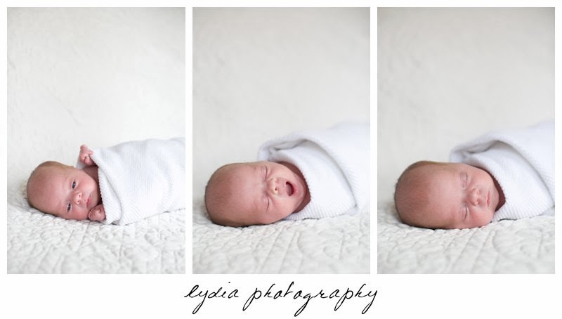 Newborn with eyes and mouth open at newborn portraits in Grass Valley, California