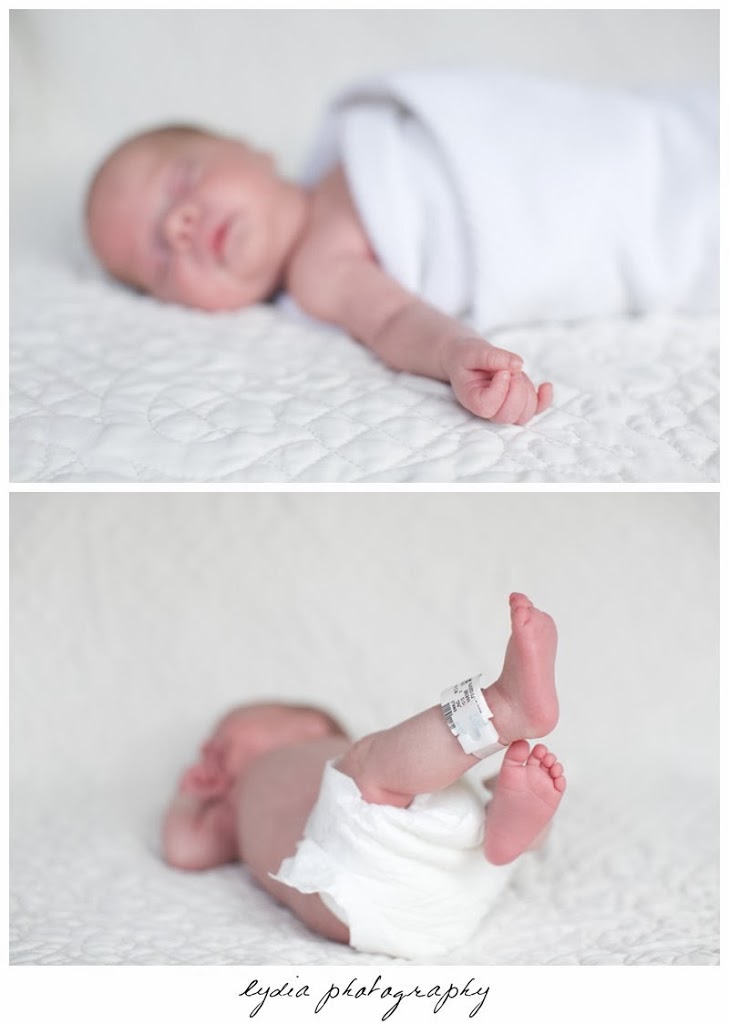 Newborn with little feet in the air at newborn portraits in Grass Valley, California
