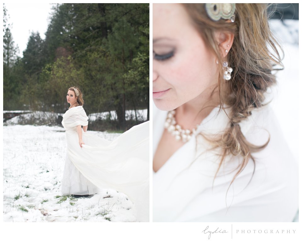 bride in the snow wearing pearl jewelry