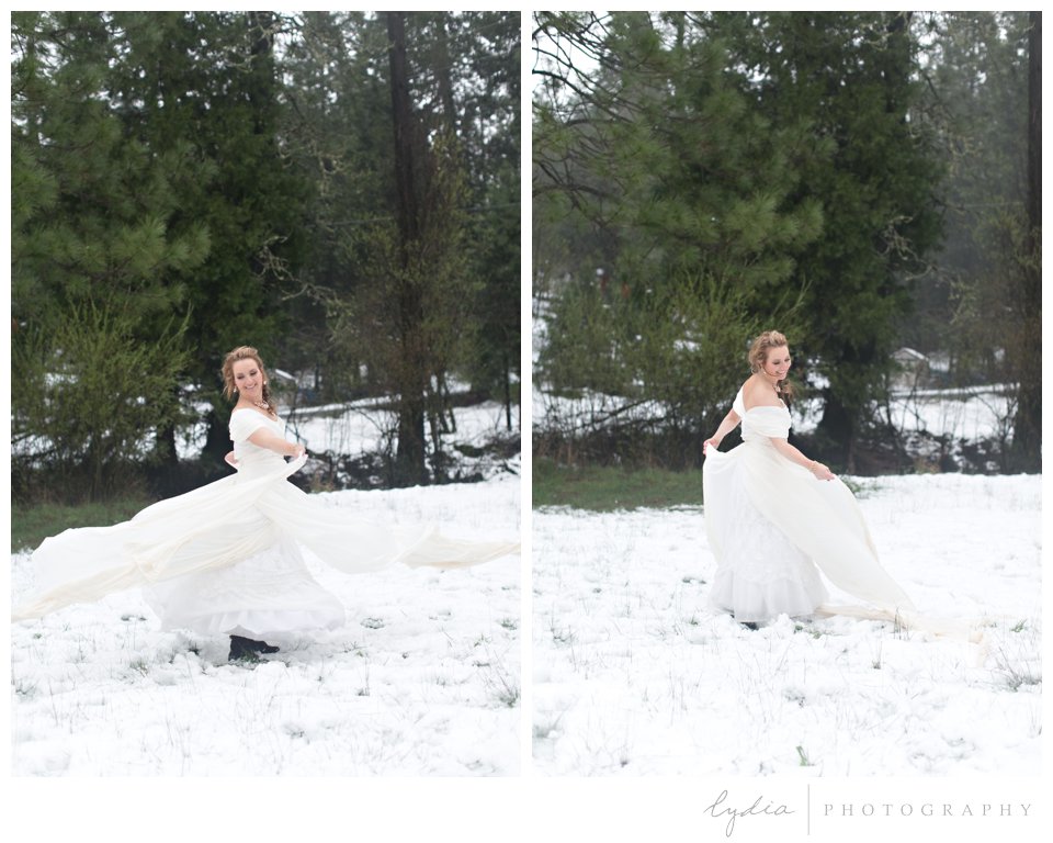 bride in the snow swirling like Elsa from Frozen 