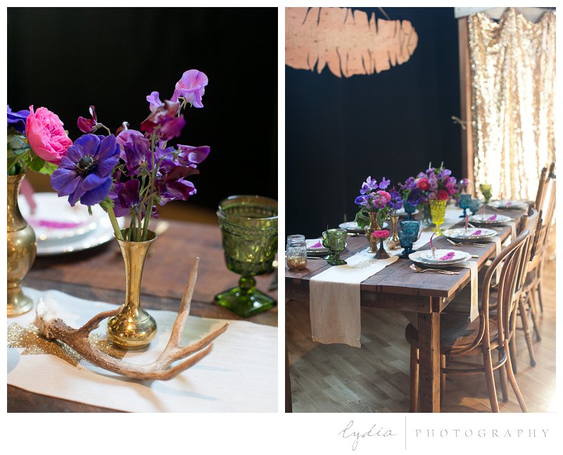 Vintage bohemian wedding reception flowers and table settings with antlers