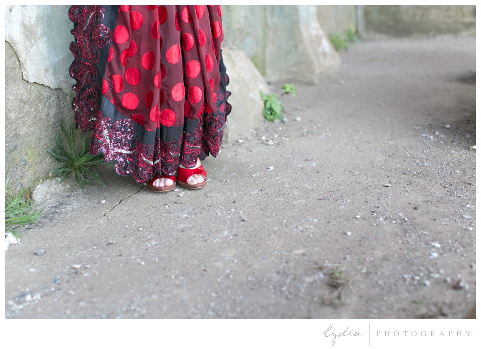 Indian bride wearing red sari and red shoes at Point Bonita