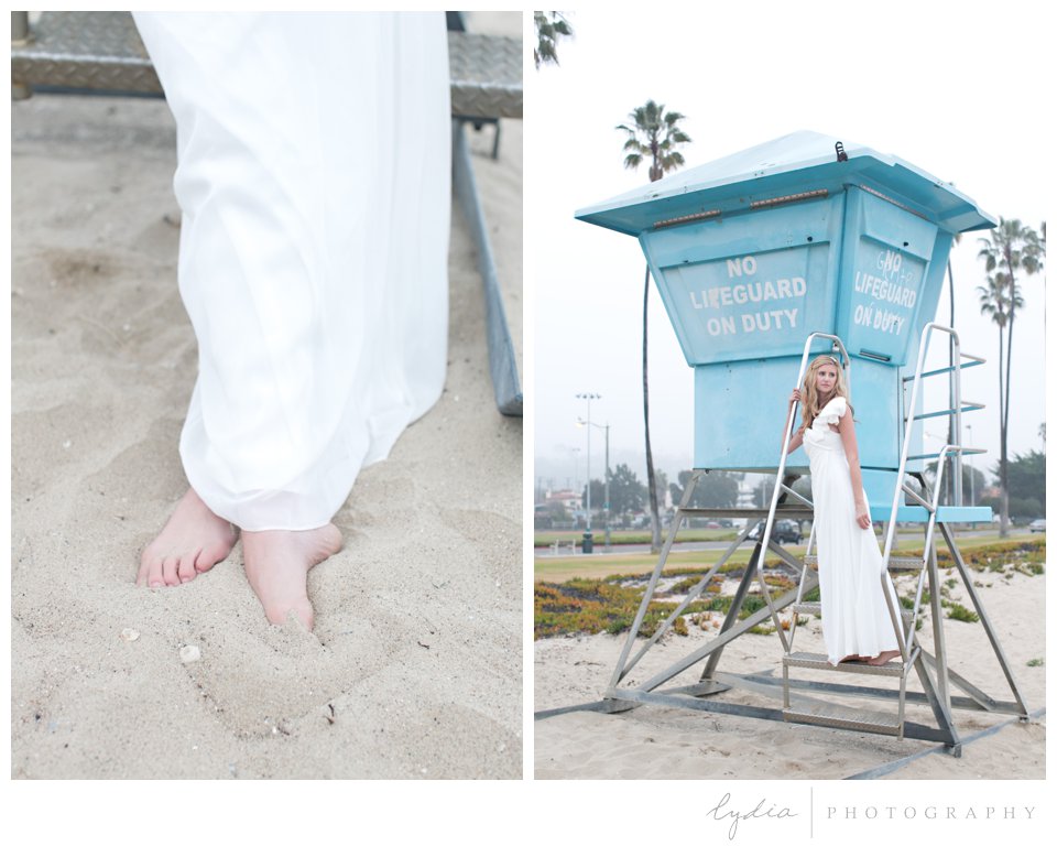 Bride on a lifeguard station on ocean  beach in Santa Barbara, California