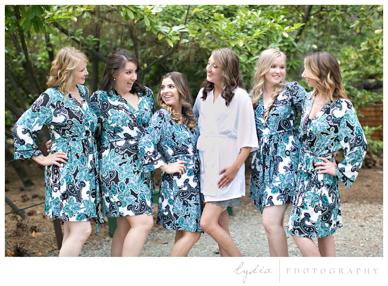 Bride and bridesmaids in blue robes at elegant vintage Empire Mine wedding in Grass Valley, California