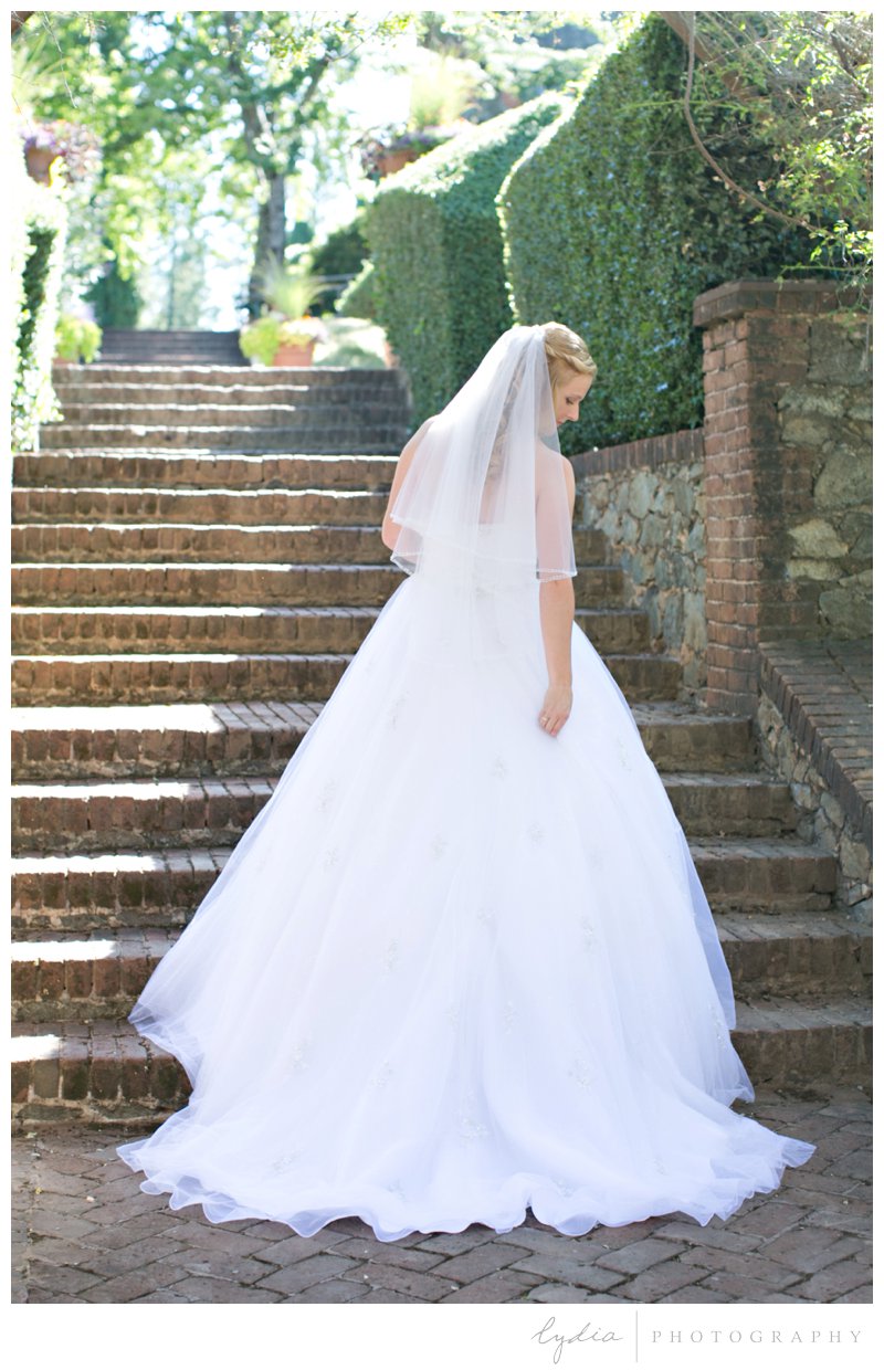 Bride in her Alfred Angelo Cinderella gown at Empire Mine fairytale wedding in Grass Valley, California 