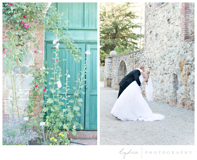Bride and groom kiss at Empire Mine fairytale wedding in Grass Valley, California 