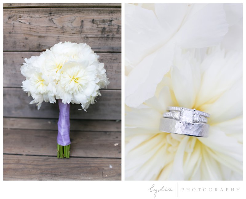 Flower bouquet and wedding rings at Squirrel Creek Ranch fairytale wedding in Grass Valley, California 