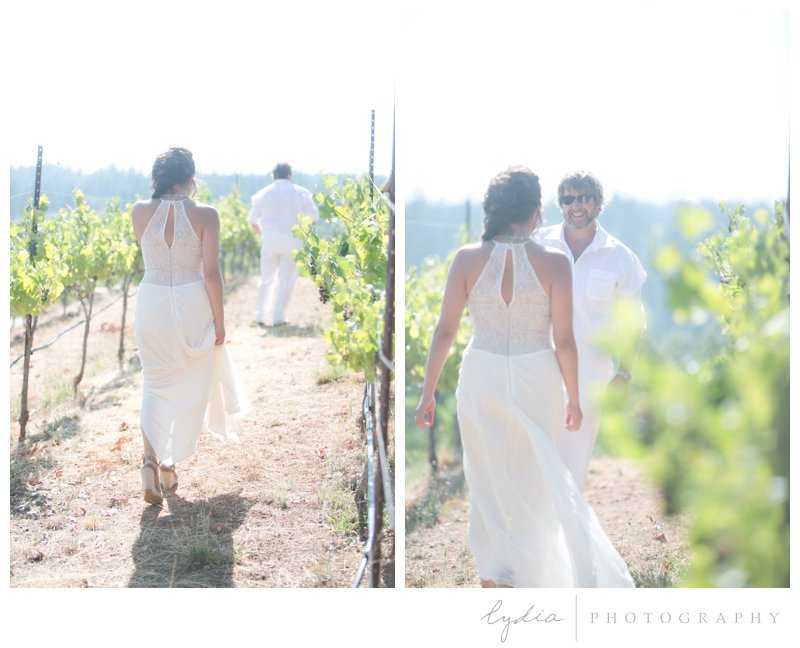 Bride and groom at the their first look for a vintage wedding at Lucchesi Vineyards in Grass Valley, California.