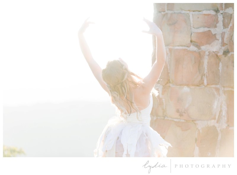 Ballerina dancing in the sunset for ballet pictures at Knapp's Castle in Santa Barbara, California.