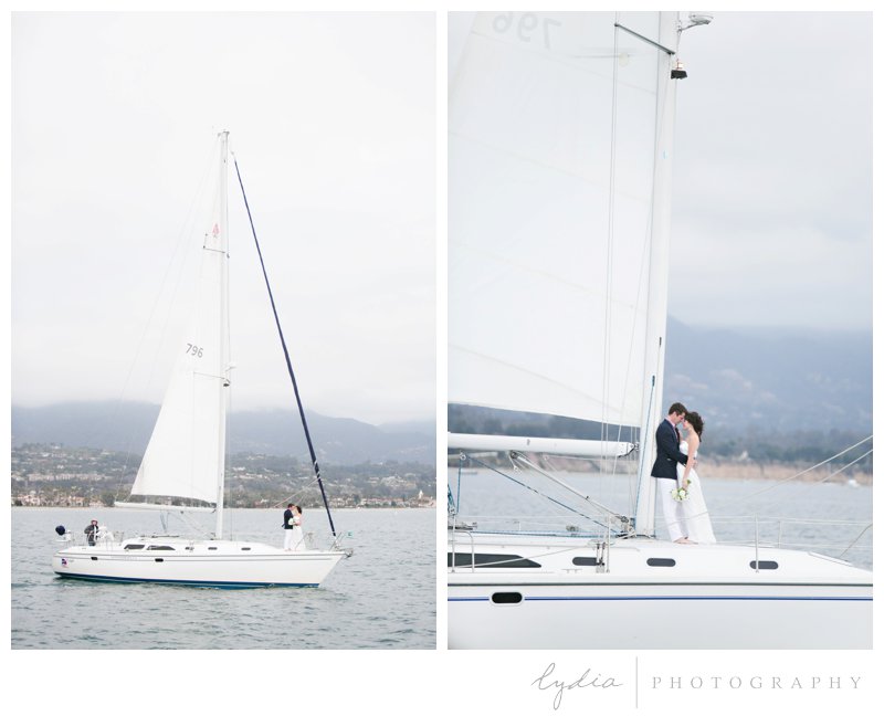 Bride and groom on the front of a boat for a nautical wedding styled inspiration portraits in Santa Barbara, California.
