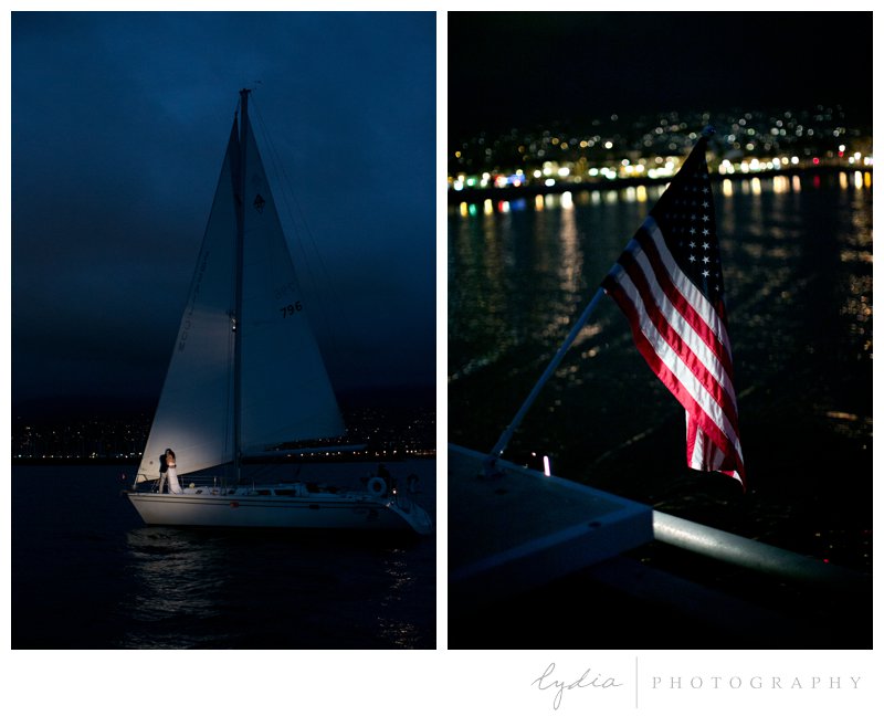 Bride and groom on a boat at night with a spotlight for a nautical wedding styled inspiration portraits in Santa Barbara, California.
