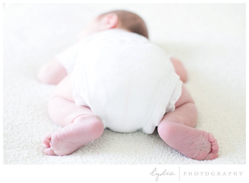 Baby's bottom and little feet for a Napa newborn portraits in California