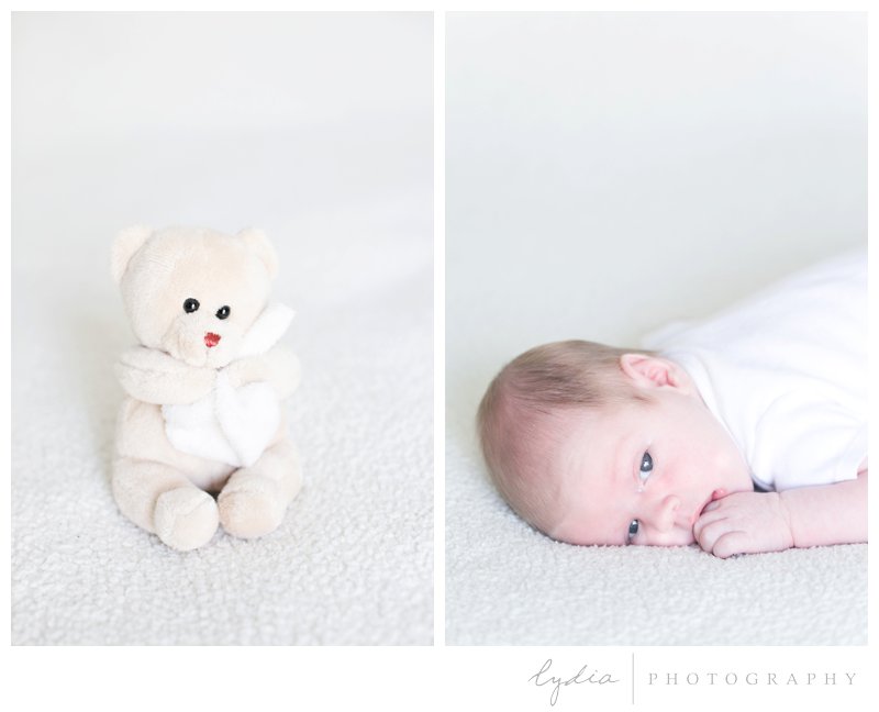 Baby and a teddy bear for a lifestyle newborn photography in Napa, California