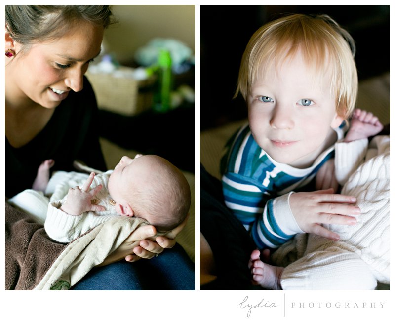 Baby with mother and older brother for a lifestyle newborn portraits in Roseville, California