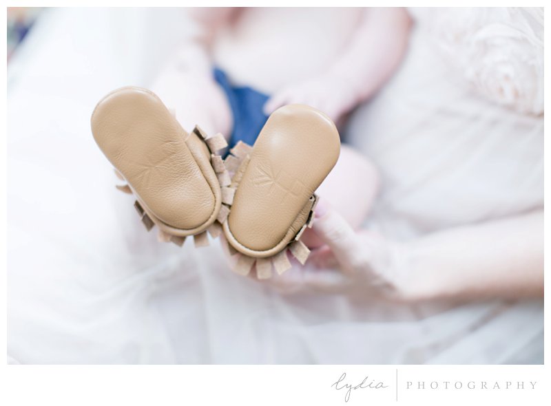 A baby wearing moccasins at southwest boho newborn inspiration in Grass Valley, California.