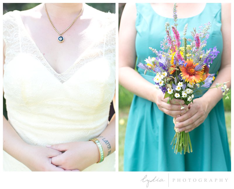 Bridesmaids with bouquet and vintage locket at rustic, garden wedding in Chicago Park, California.