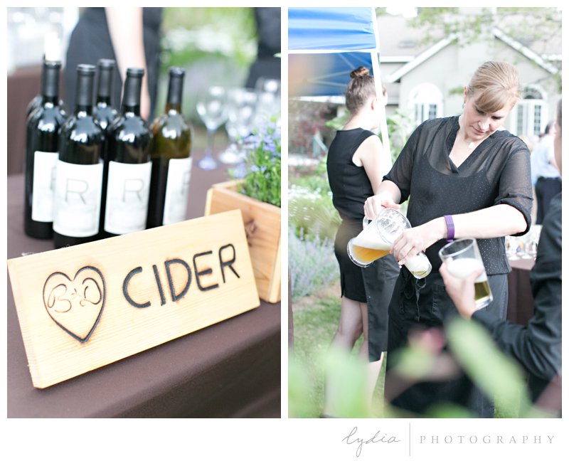 Wood burnt sign for drinks at rustic garden wedding in Chicago Park, California.