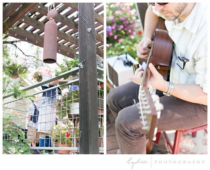 Wedding gong ringers and professional guitarist at rustic garden wedding in Chicago Park, California.