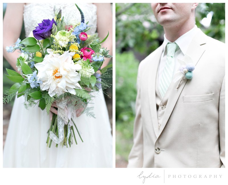 Bride with wildflower wedding bouquet and groom with boutonniere at Harmony Ridge Lodge in Grass Valley, California.