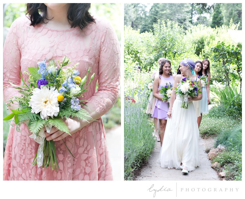 Bride and bridesmaids walking down the path at Harmony Ridge Lodge wedding in Grass Valley, California.