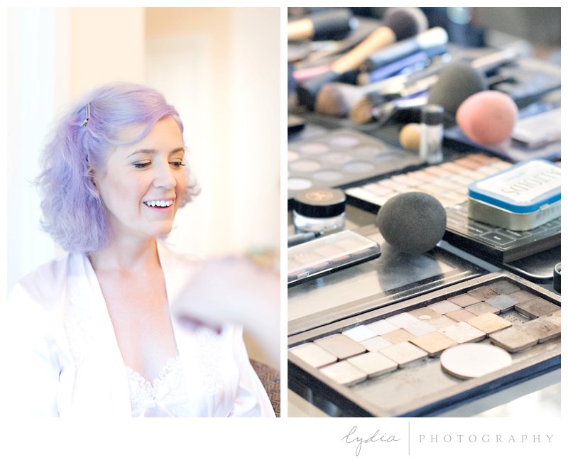 Bride getting ready with makeup at Harmony Ridge Lodge in Grass Valley, California.