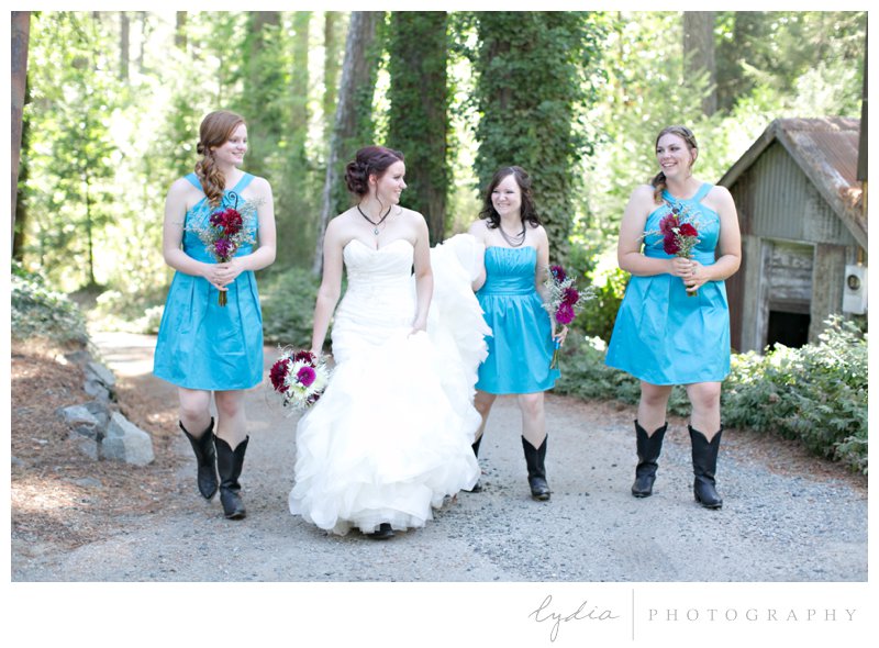 Bride and bridesmaids with cowboy boots for a modern wedding at Empire Mine in Grass Valley, California.