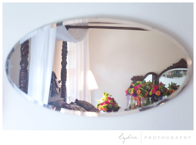 Bouquets through a mirror for a bright summer wedding in Browns Valley, California.