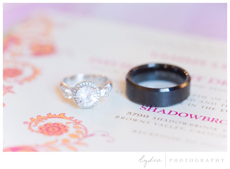 Bride and groom's rings for an bright colored wedding in Browns Valley, California.