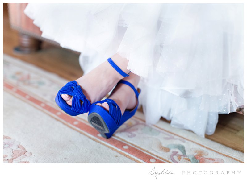 Bride's blue heel shoes at a barn wedding at Squirrel Creek Ranch in Grass Valley, California.