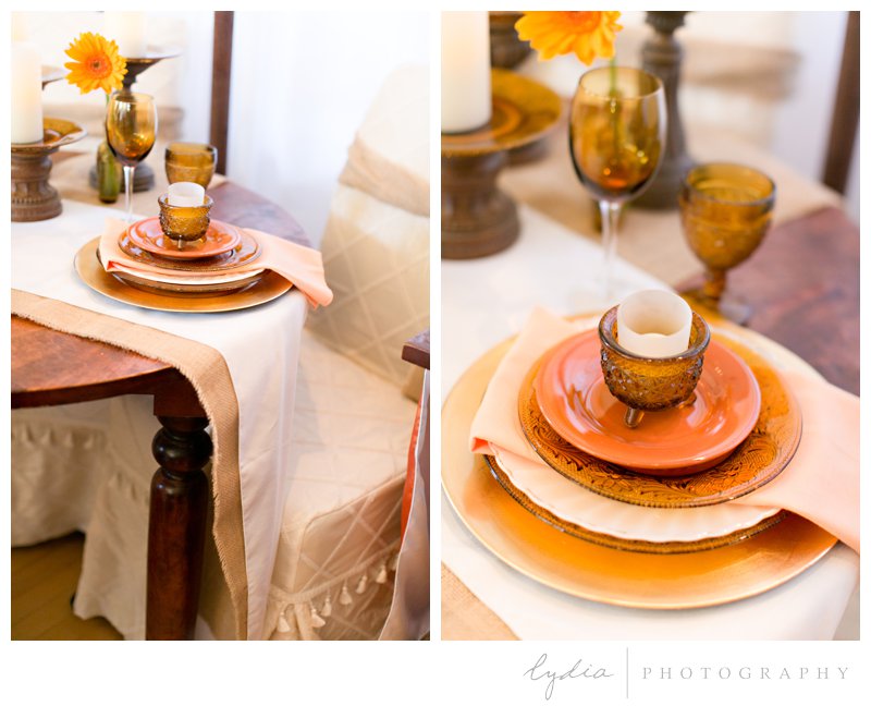Rust, orange, and cream rustic table setting for a fall wedding in Grass Valley, California.