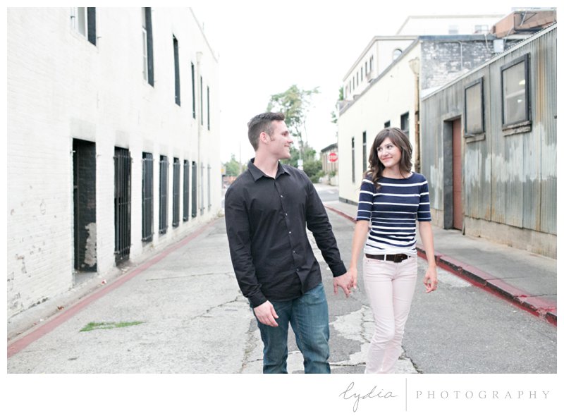 Bride and groom at engagement portrait session in downtown Grass Valley, California.