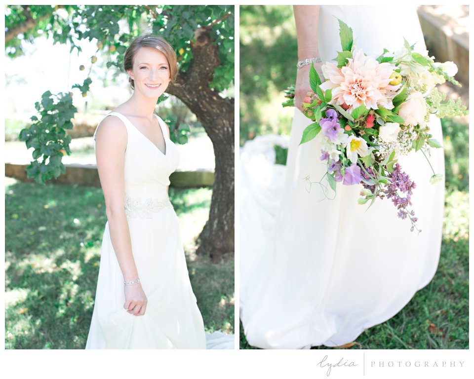 Bride holding her bouquet at Lucchesi Vineyards in Grass Valley, California.