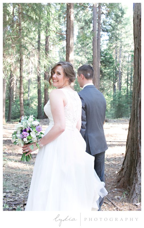 Bride and groom in the Tahoe forest at Harmony Ridge Lodge in Nevada City, California.